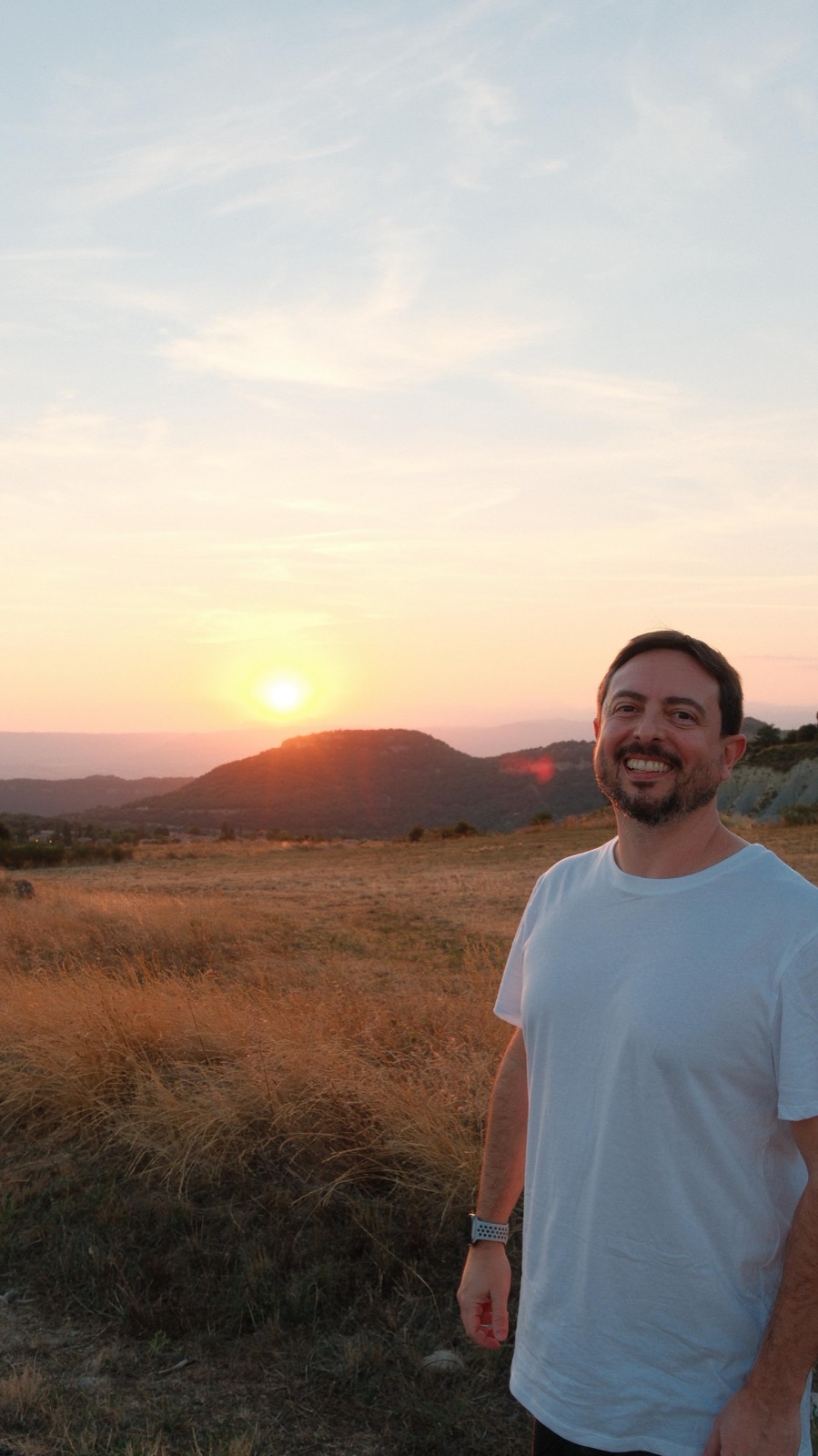 Pedro watching the sun drop behind the hills