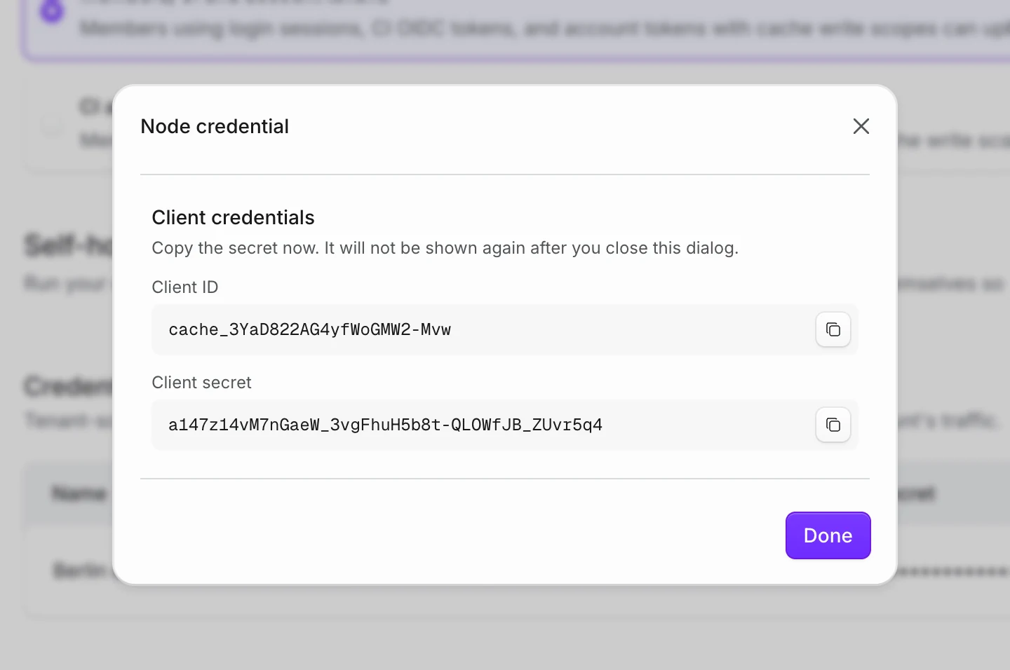 The Tuist dashboard showing the generated client identifier and secret for a self-hosted cache node.