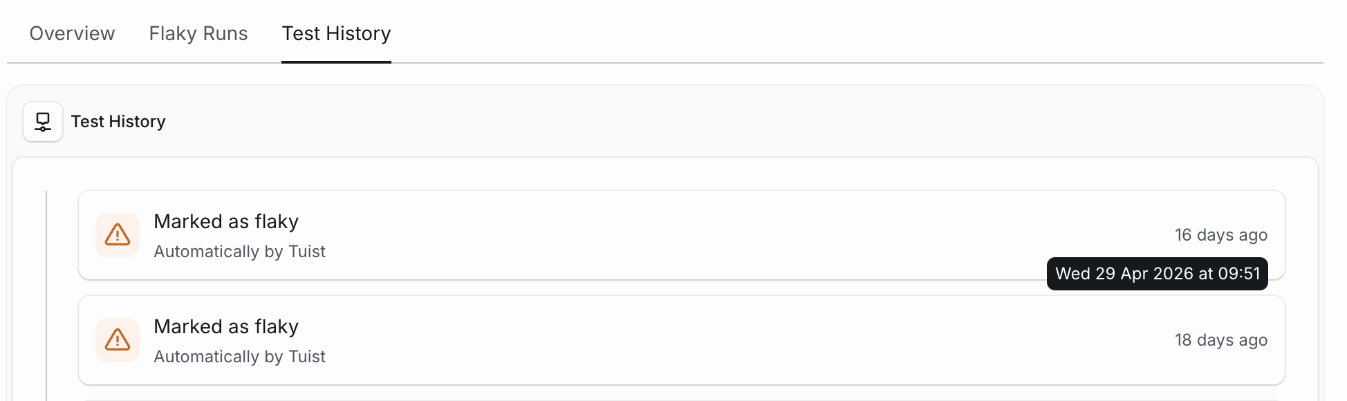 Test history timeline with a tooltip showing the exact timestamp for a flaky event